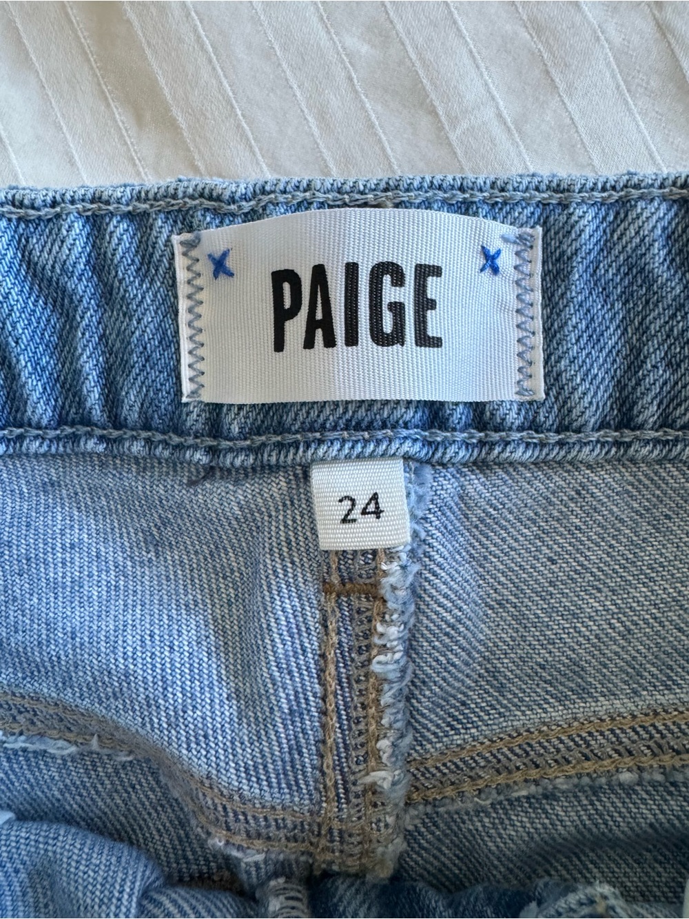 PAIGE woman’s Noelia Light Blue Straight-Leg Jeans with Distressed Detail